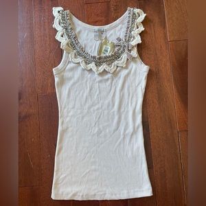 Embellished tank